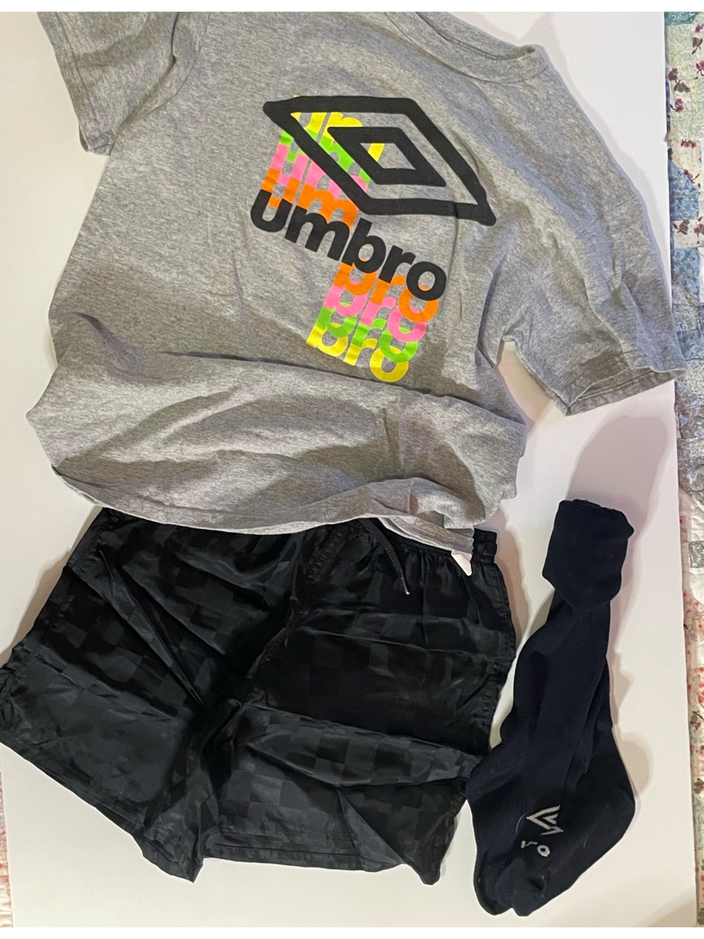 Umbro Kids Black Athletic Shorts with Gray T-Shirt and socks